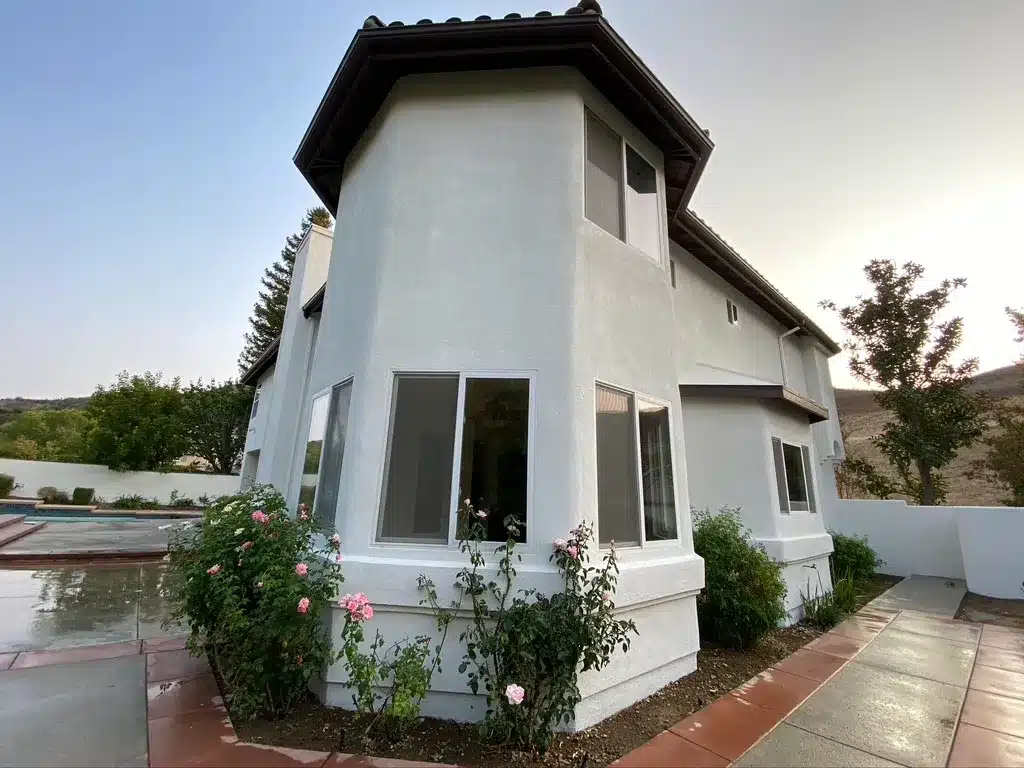 Residential Exterior Painting Services in Simi Valley California Freshly painted white stucco exterior of a residential home in Simi Valley, California.